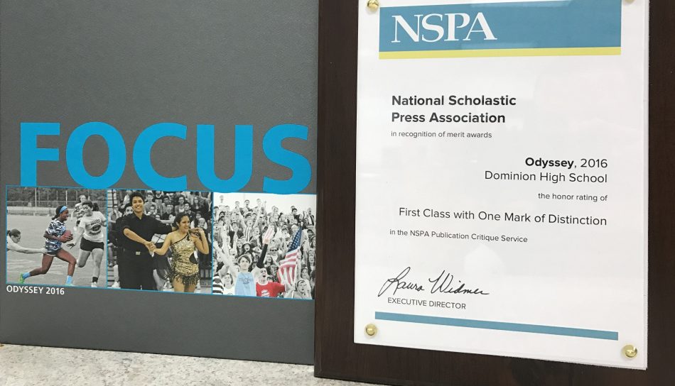 Last years yearbook with the NSPA plaque, which incorrectly has one mark of distinction instead of the two earned.