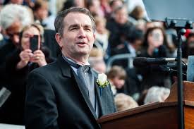 Ralph Northam, the Virginia governor, remains in office, but is under pressure to resign.