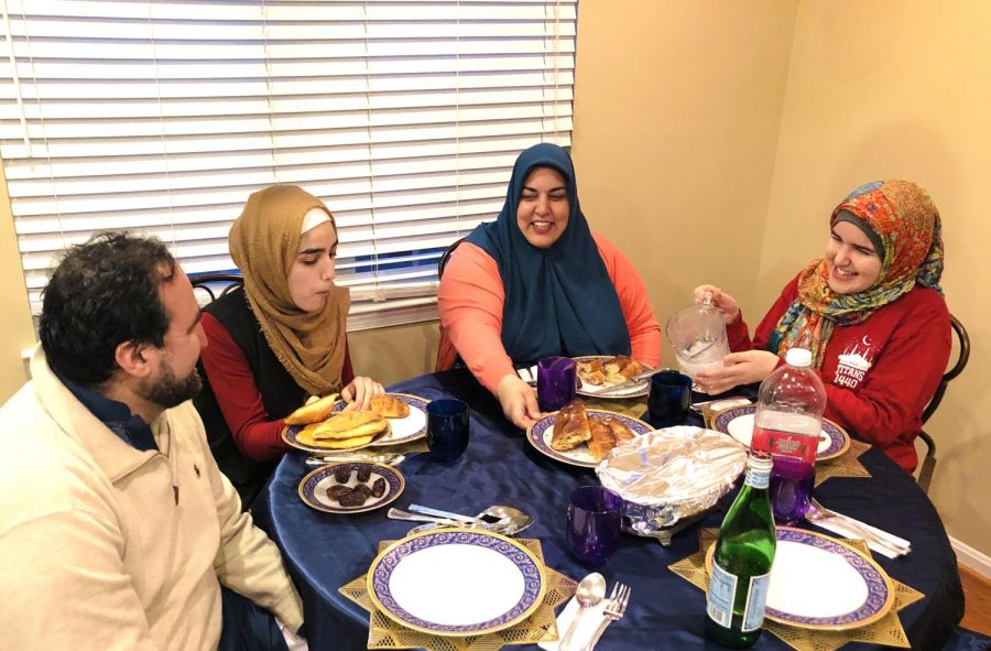The Khan family enjoying dinner together during this very unique Ramadan.