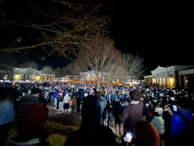 Hundreds+of+UVA+students+and+Charlottesville+community+members+gather+Monday+for+an+unofficial+vigil+in+honor+of+the+three+lives+lost.+