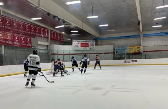 The DomFalls Ice Hockey team faces off against Briar Woods.