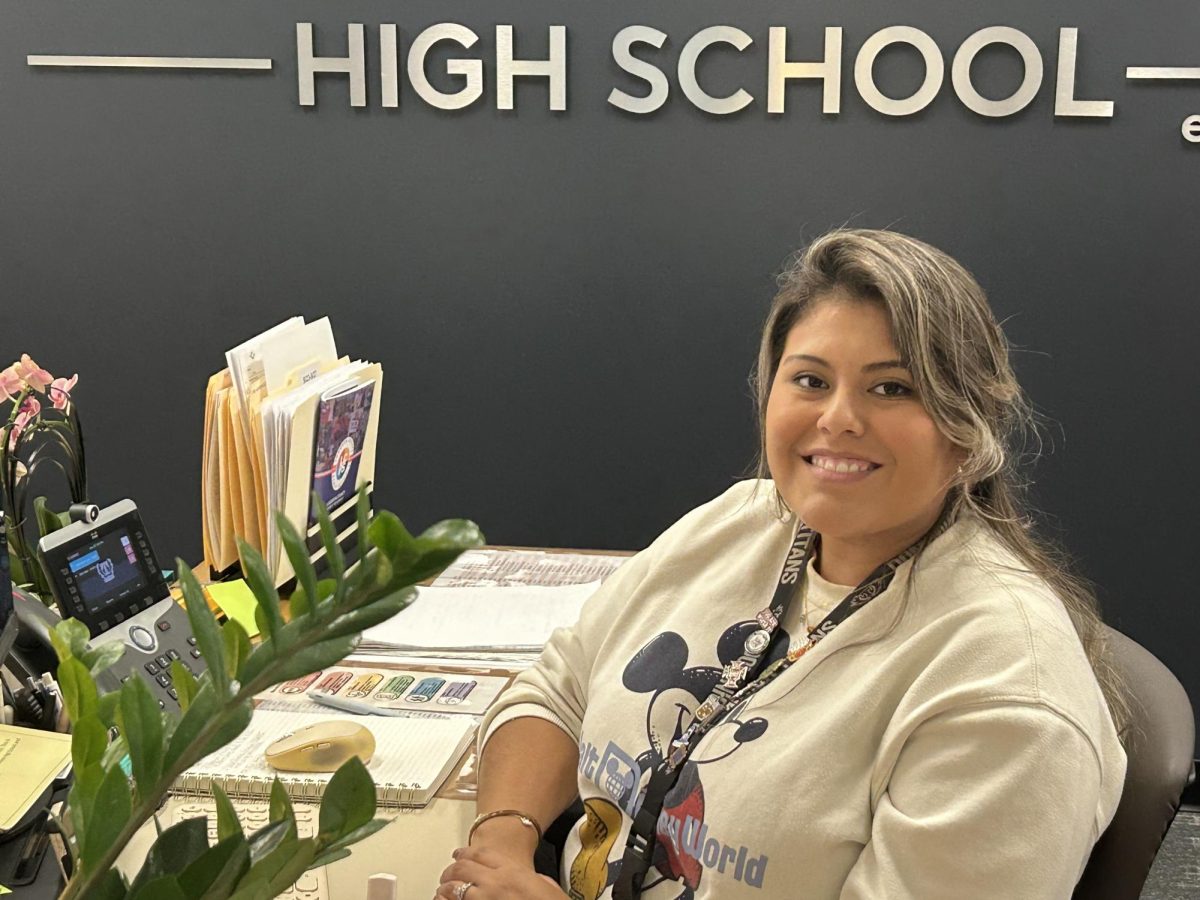 Ms. Moutrans desk in the main office behind the front desk.