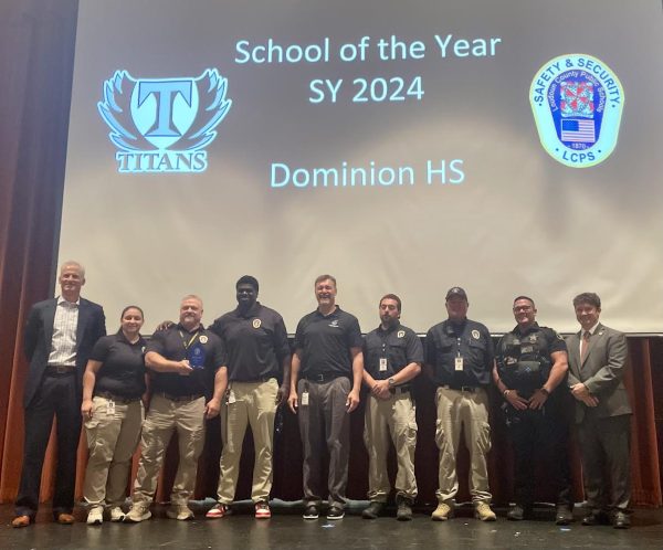 Titan security staff team on stage after awarded with their School of the Year Safety and Security Award. 
(Photo Courtesy of Timothy Macbeth)