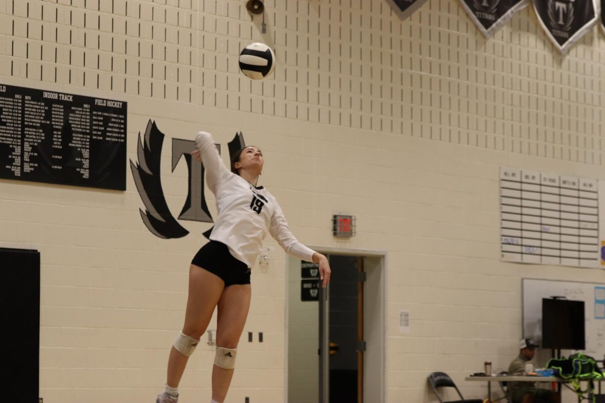 #19, senior Alena Smith, leads the team in kills per set as an outside hitter this year.