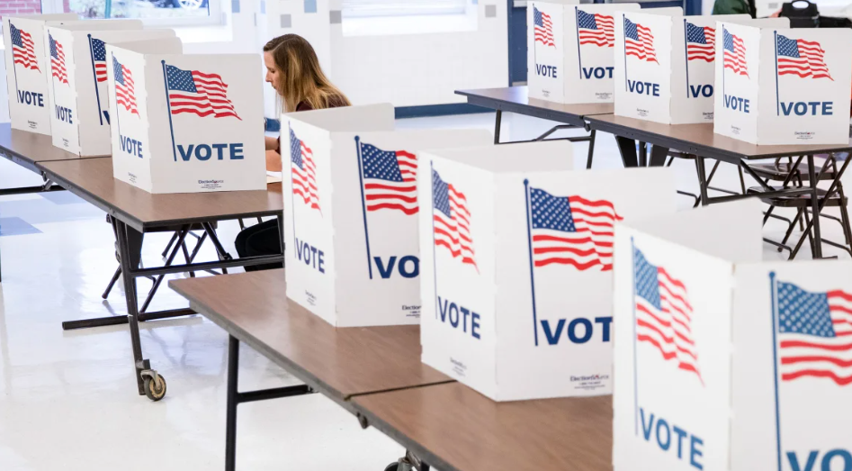 At a voting site in Alexandria Virginia, a woman participated in the primary election on Super Tuesday.           
(Photo Courtesy of Samuel Corum/ Getty Images)