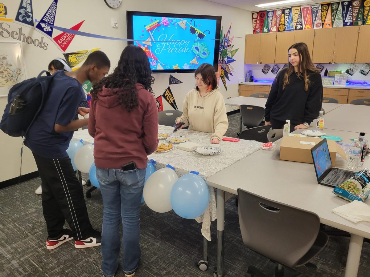 Students and staff stopped by to try the Hamantaschen.