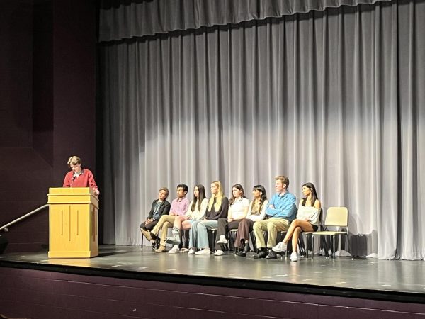 Upperclassmen student representatives help induct students joining at the induction.