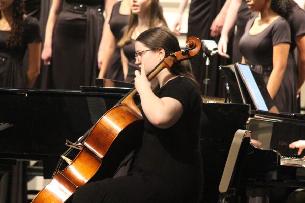 Callie Banks played the cello for the Dominion choirs performance.